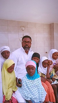 Ustaz Ifriqi with his pupils